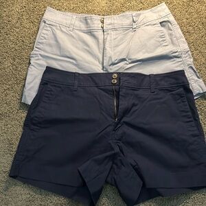 A New Day! 2 pair of shorts. Size 14 stretch. Blue/gray and dark navy blue!